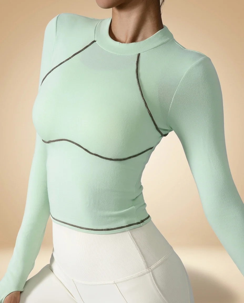Walundi tops and tanks collection — soft sand-toned organic cotton tank on sage linen